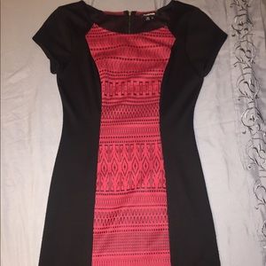 Red and black dress, tribal pattern.